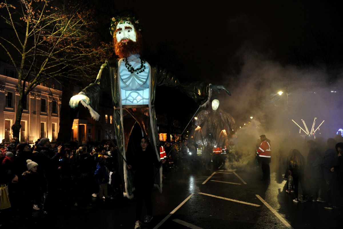 Giant puppets of Ghost of Christmas Past and Present at Christmas Light Switch On